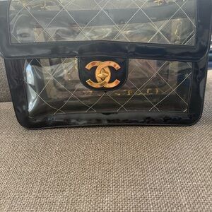 CHANEL Transparent Bag with Black and Gold Accents